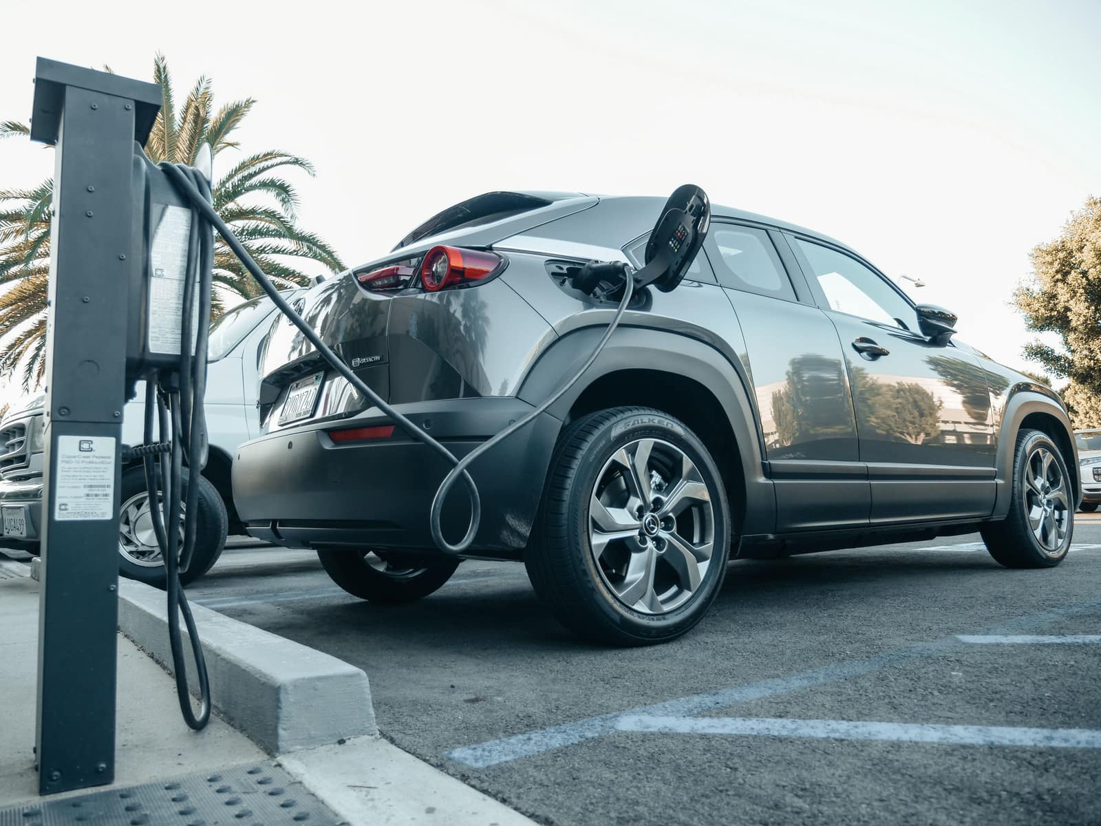 Used electric vehicle being inspected before import