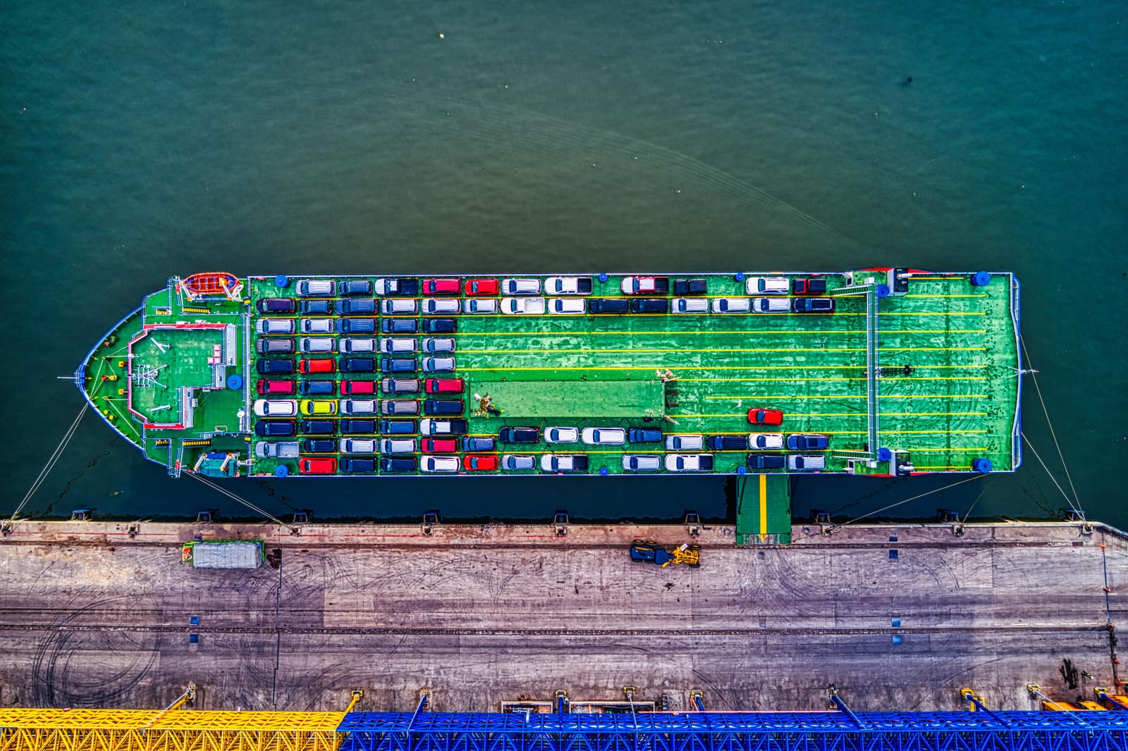 Cars loaded onto a RoRo ship and into a shipping container