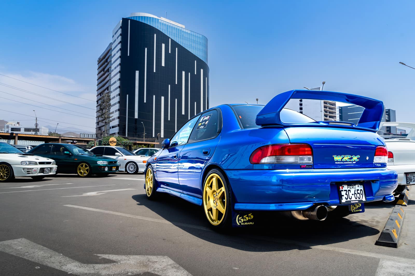 Subaru WRX STI and Mitsubishi Lancer Evo side by side