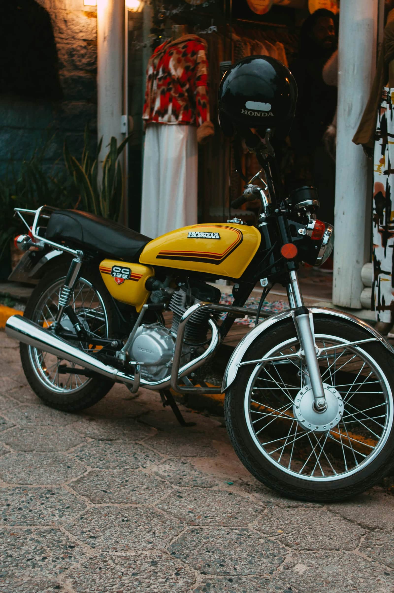 Classic Honda CG 125 motorcycle, echoing Honda's origins in engines