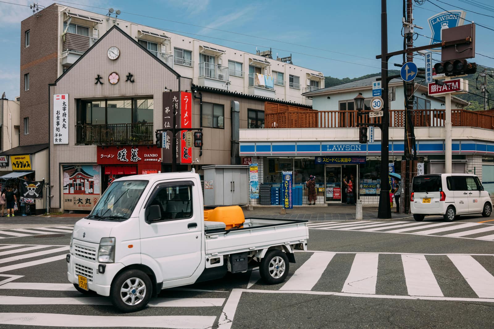 Suzuki Carry kei truck on a Japanese town street